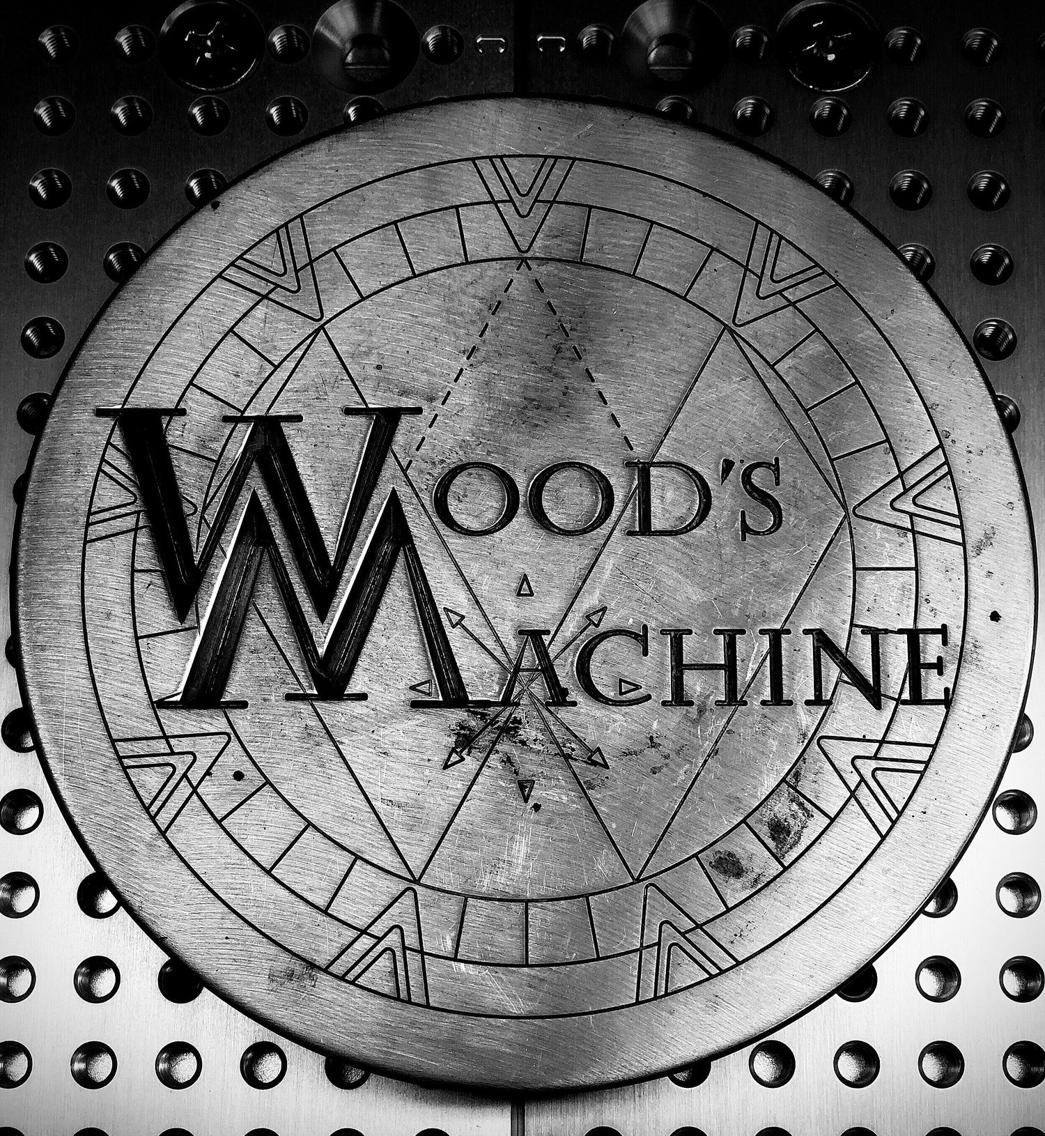 Wood's Machine Service INC. logo